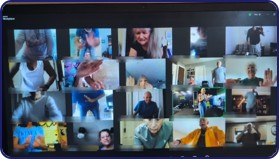 A screen full of senior residents taking a live Healthy H.O.M.E.S. fitness class together from their own homes