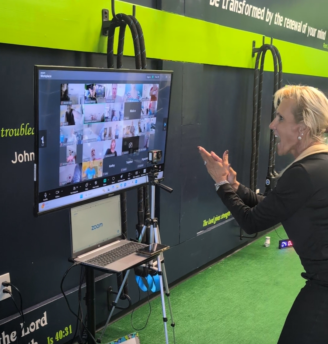 Certified senior fitness instructor Maresol Wehner teaching a live class to residents on screen